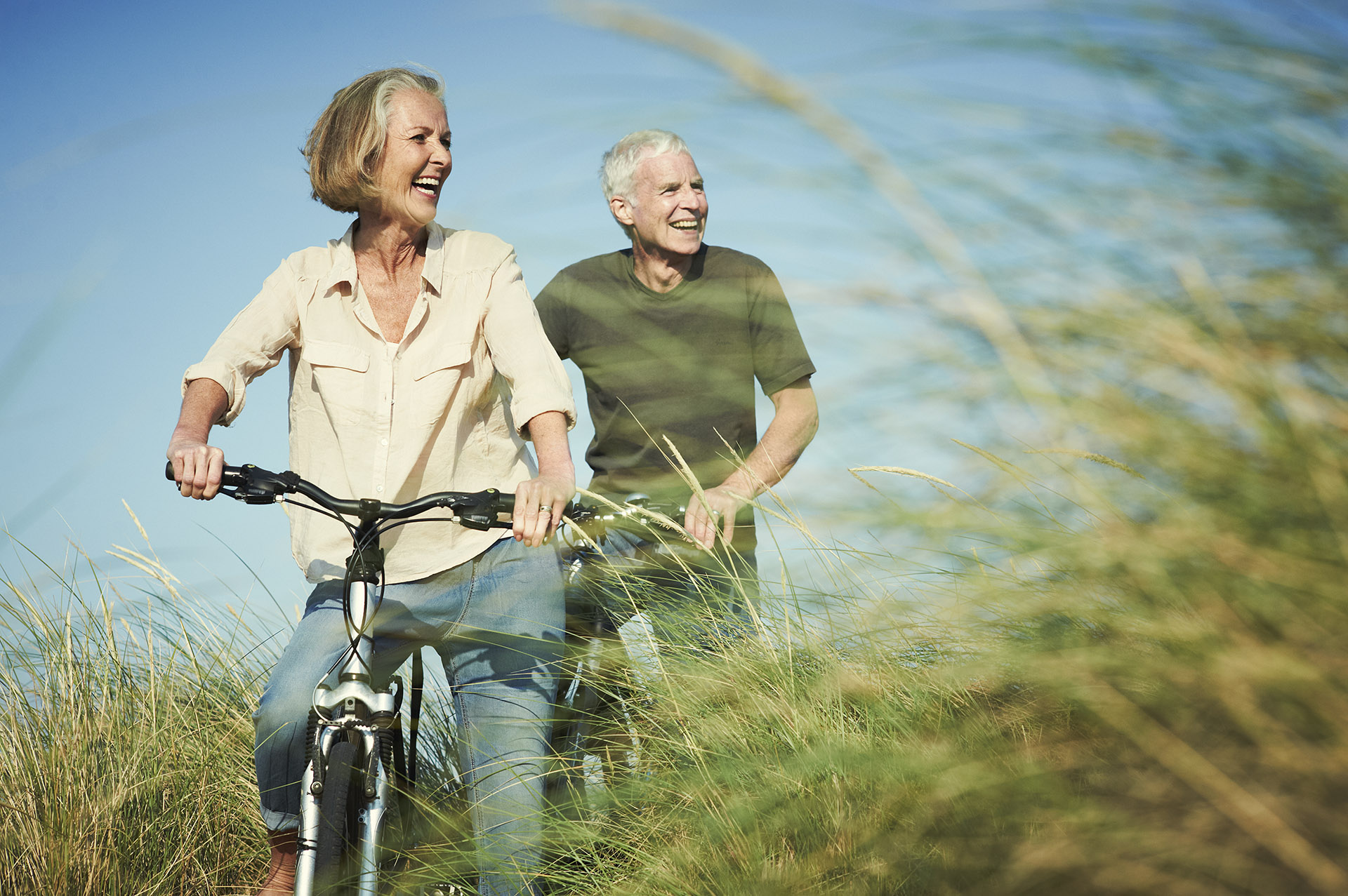 Senior couple enjoying day out on their bicycles