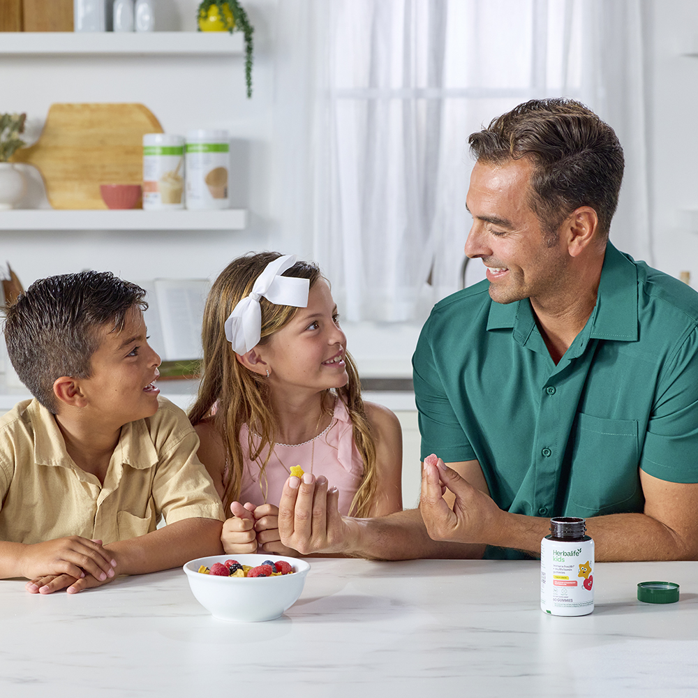 li-father-shows-kids-gummies-in-the-kitchen-1.jpg